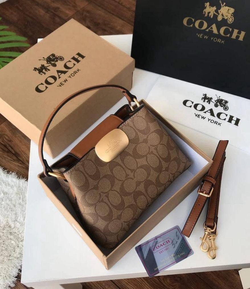 04. Coach Signature Mini Bucket Bag — Tan