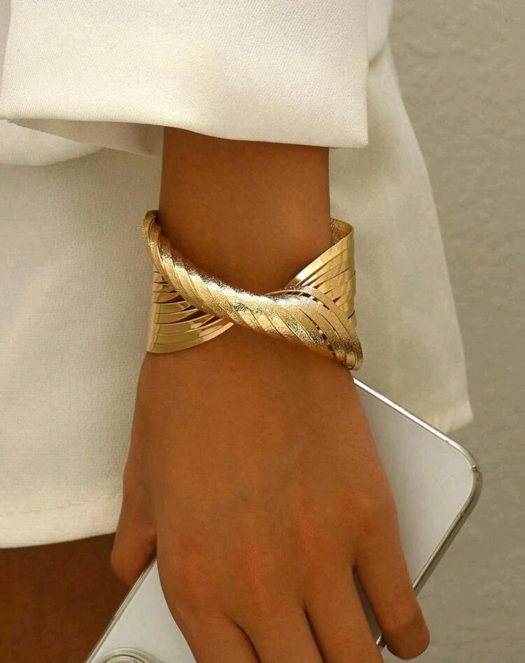 11. Gold Crossover Wide Statement Cuff Bracelet