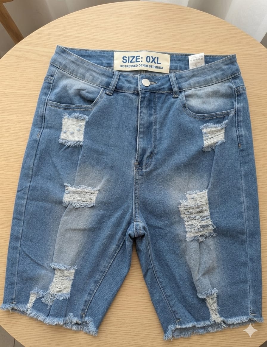 13. Distressed Denim Bermuda Shorts