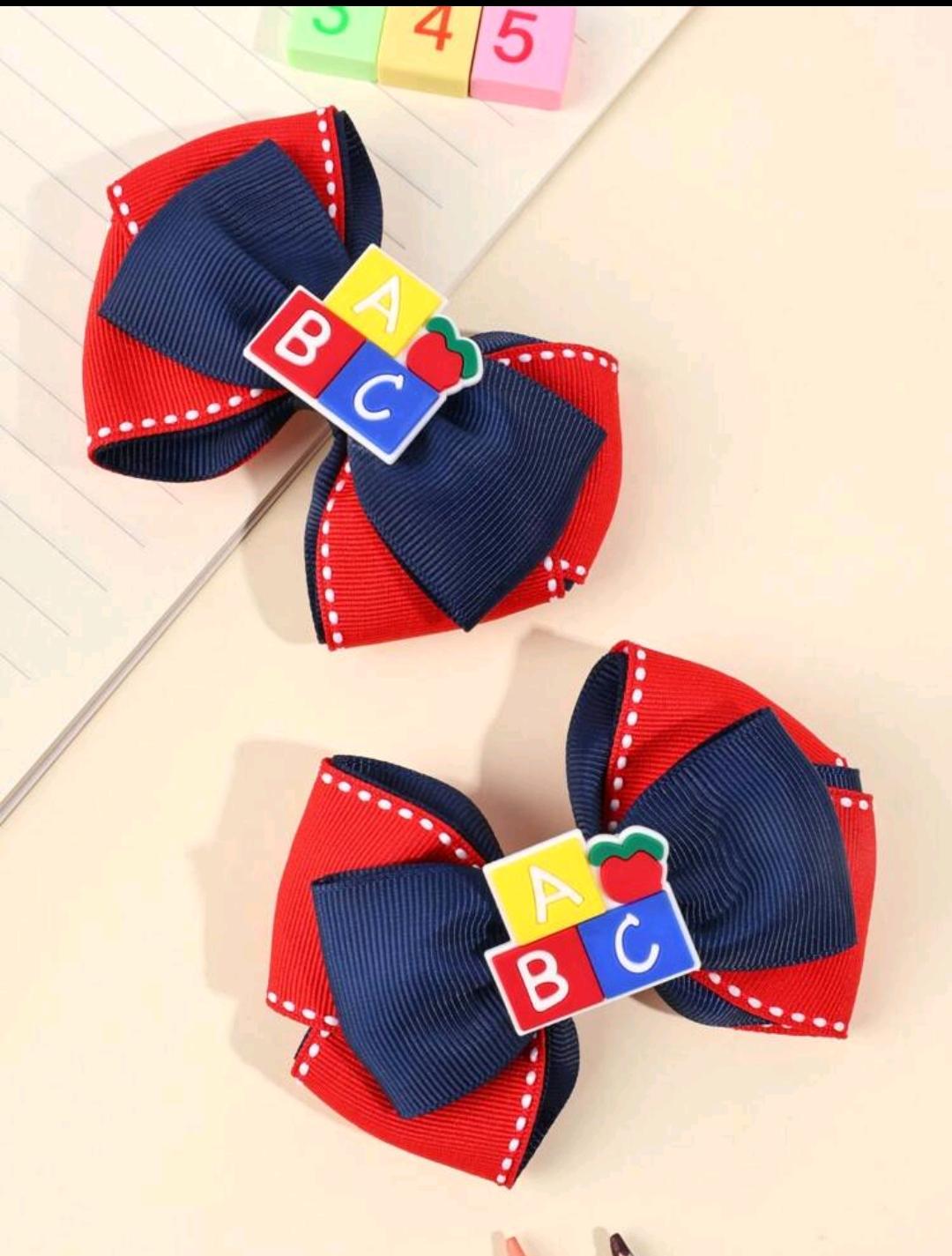 09. Navy & Red ABC Blocks Bow Clips — 2 pcs